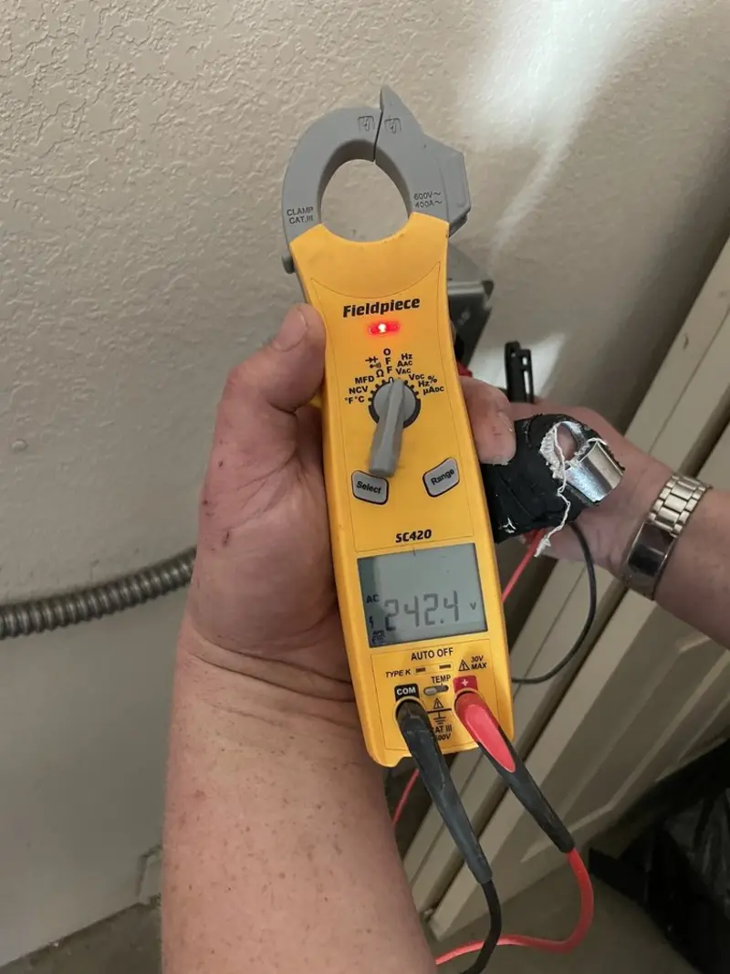Voltage testing with clamp meter during Outlet Installation in Short Pump